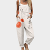 Irena | Kombinezon w kółka pomarańczowe - biały